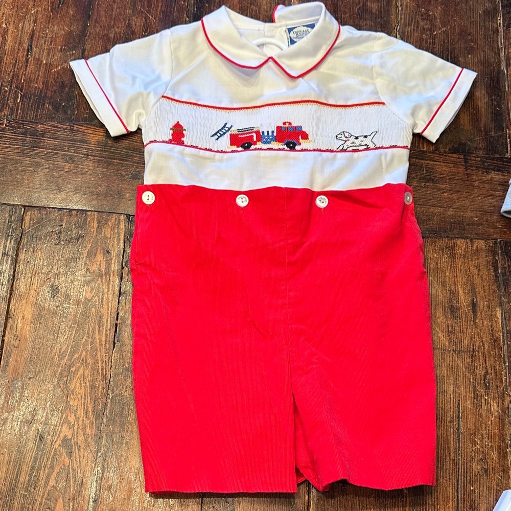 Carriage Boutique. Red and White  Jon Jon with Firetruck Smocking. Size 24M